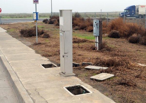 This was the scene at the Highway 41 overpass site on Bush Street Wednesday, Dec. 11, as vandals attempted to steal valuable copper wire.